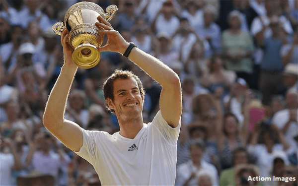 Andy Murray holding up Wimbledon trophy