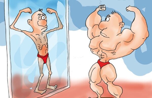 A cartoon: a muscly man looking in a mirror and seeing a weedy reflection