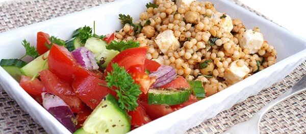 Couscous and a tomato salad in a dish