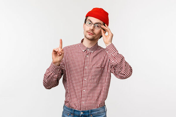 A man with glasses and a red hat