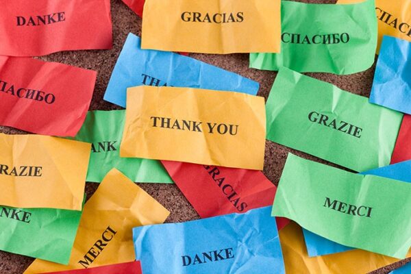 Different coloured post-its with thank you written in different languages